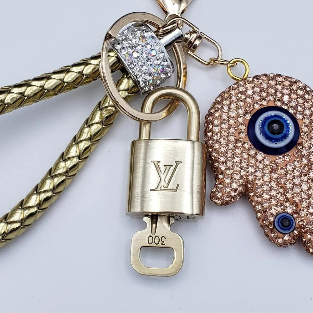 Authentic Louis Vuitton Lock & Key with unbranded Evil Eye Bagcharm 011526